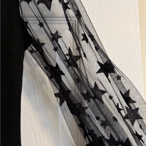 SHEIN Black Jumpsuit with Sheer Star Sleeves